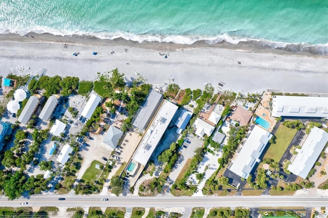 bird's eye view featuring a beach view and a water view