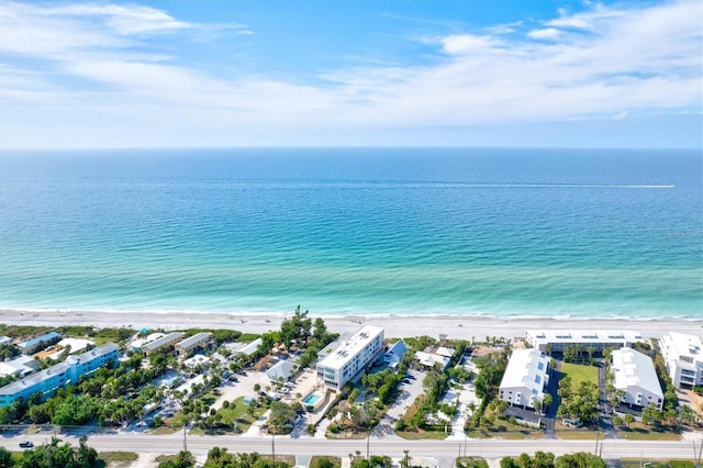 aerial view featuring a water view and a beach view