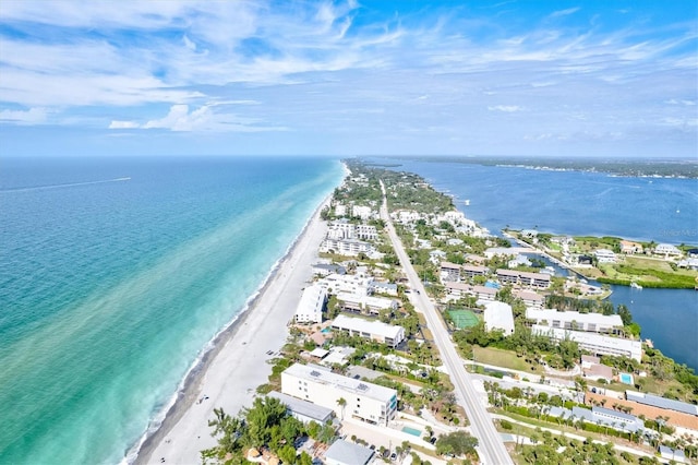 drone / aerial view with a view of the beach and a water view