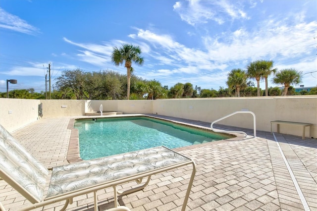 view of pool with a patio area