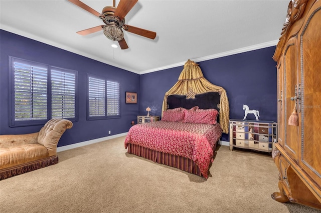 carpeted bedroom featuring ceiling fan and ornamental molding