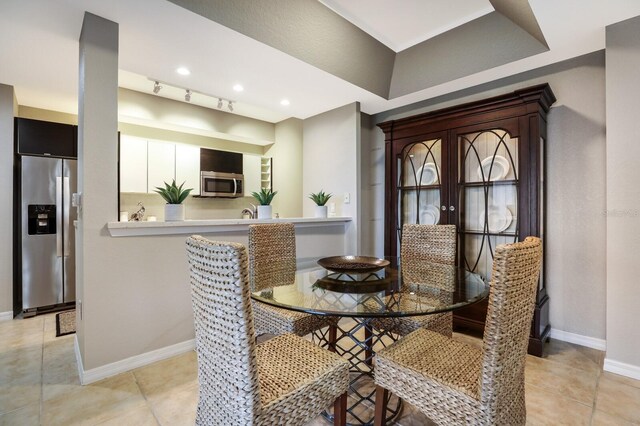 view of tiled dining space