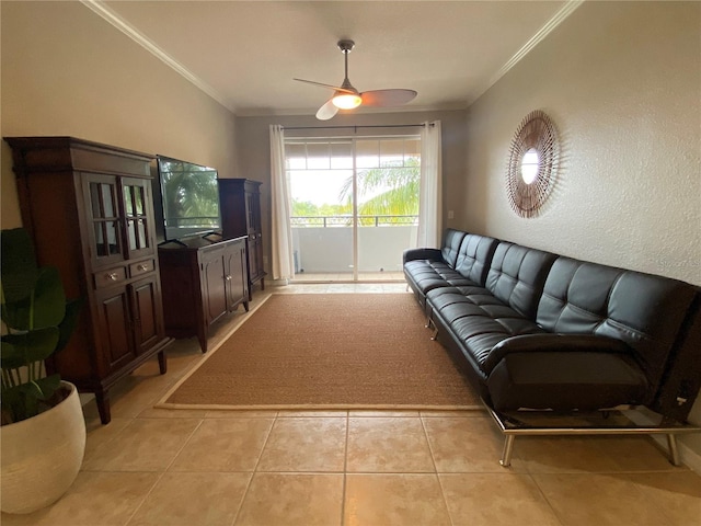 living room with ceiling fan, crown molding, and light tile patterned flooring