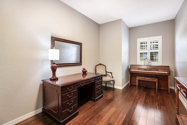 office area featuring dark wood-type flooring