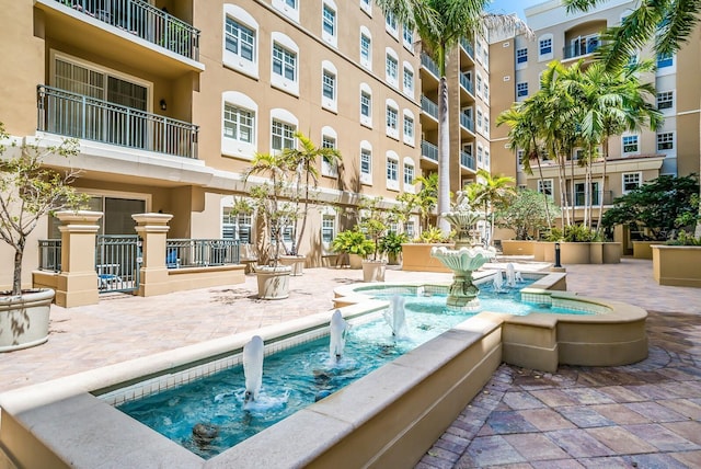 view of pool featuring pool water feature