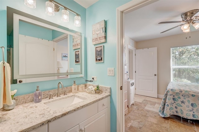 bathroom featuring ceiling fan and vanity