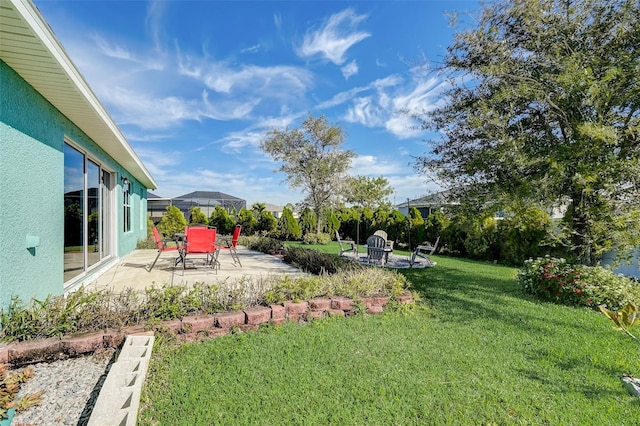 view of yard with a patio area