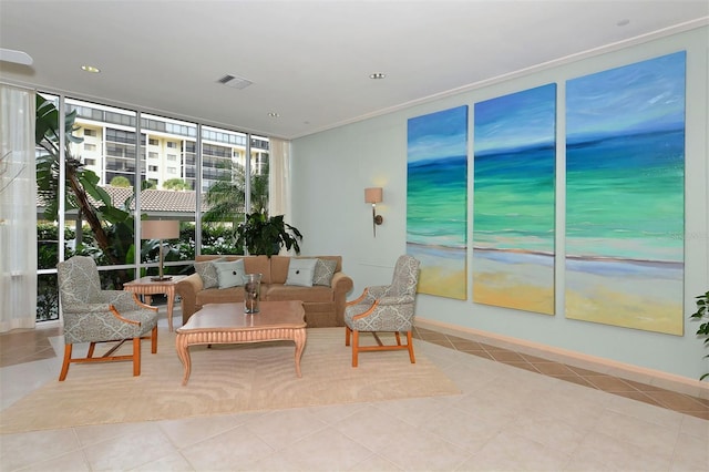 tiled living room featuring a wall of windows