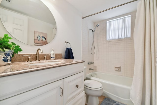 full bathroom featuring vanity, toilet, and shower / bath combo with shower curtain