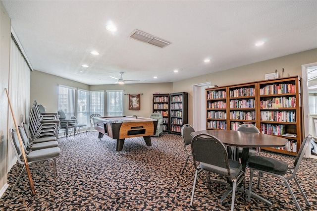 playroom featuring ceiling fan, carpet floors, a textured ceiling, and billiards