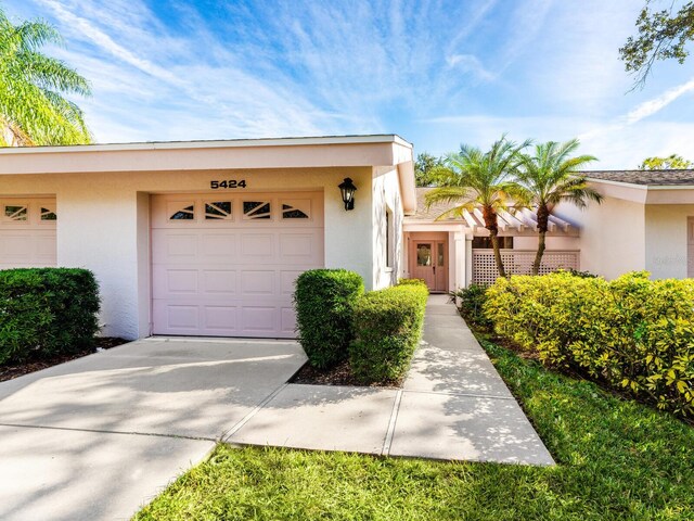 exterior space with a garage