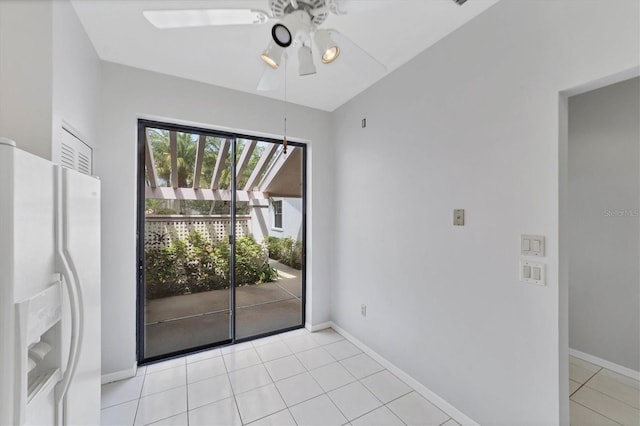 interior space featuring ceiling fan