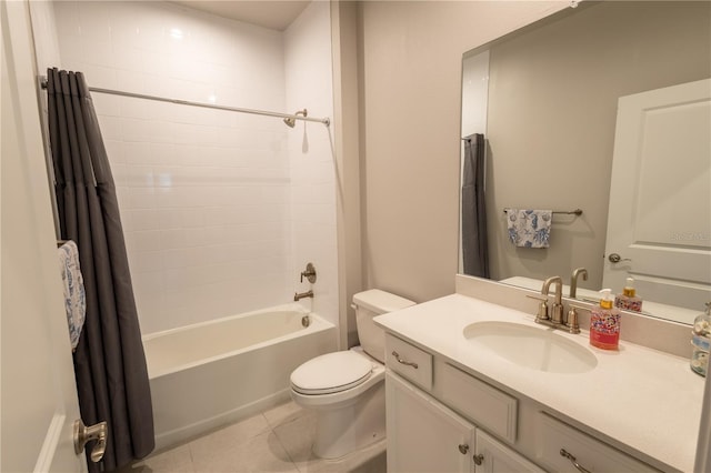 full bathroom featuring tile patterned floors, shower / tub combo with curtain, vanity, and toilet