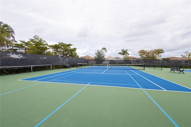 view of tennis court with basketball court