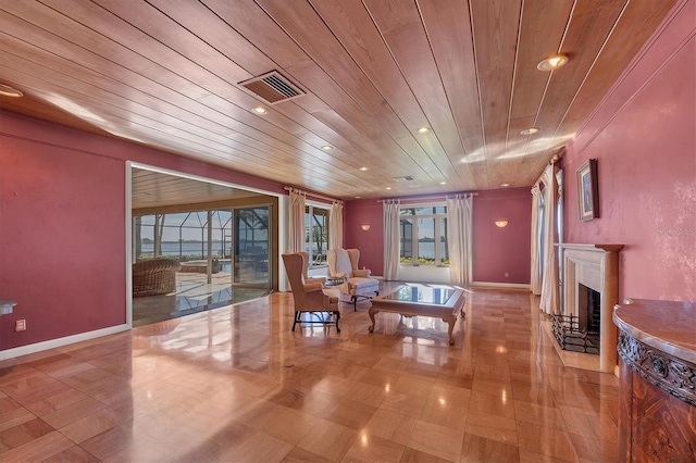 sitting room with visible vents, baseboards, wood ceiling, recessed lighting, and a fireplace