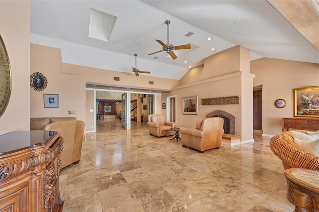 living room with visible vents, a brick fireplace, baseboards, ceiling fan, and high vaulted ceiling