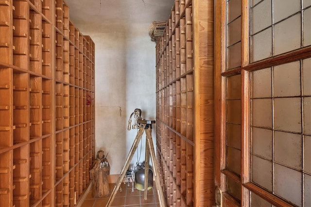 wine area featuring tile patterned floors