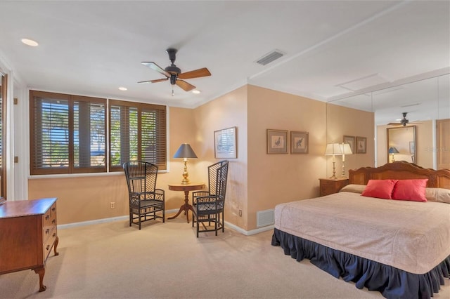 bedroom with visible vents, baseboards, and carpet