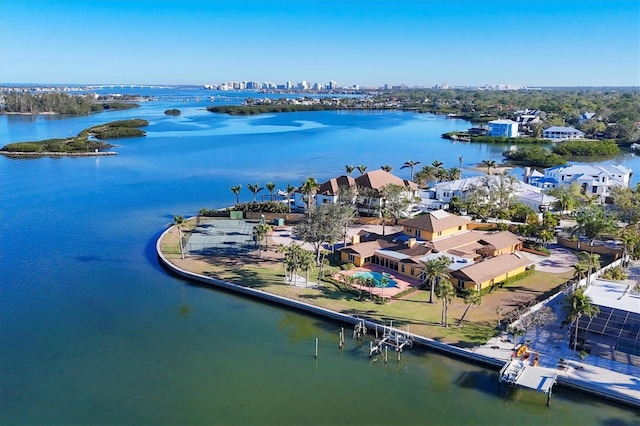 drone / aerial view featuring a residential view and a water view