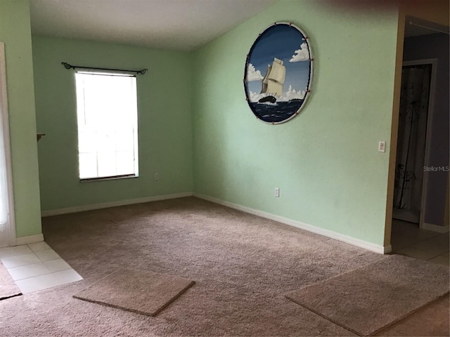 spare room with carpet