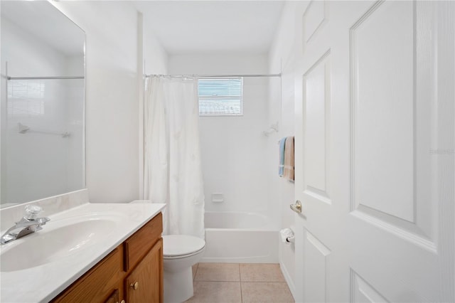 full bathroom featuring toilet, shower / bath combination with curtain, vanity, and tile patterned floors