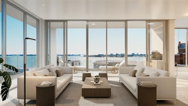 sunroom / solarium with a water view and a healthy amount of sunlight