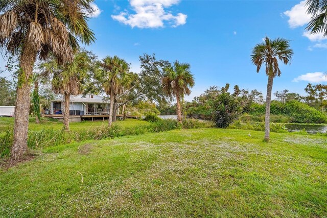 view of yard featuring a deck