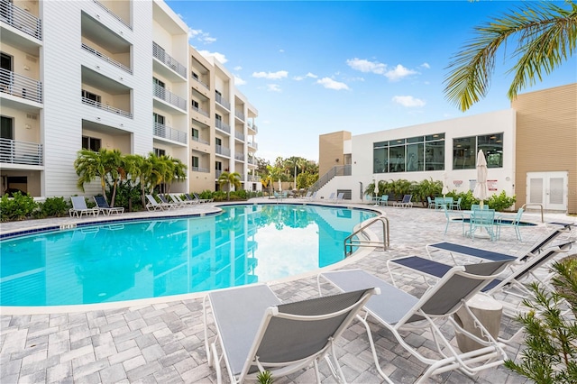 view of pool featuring a patio