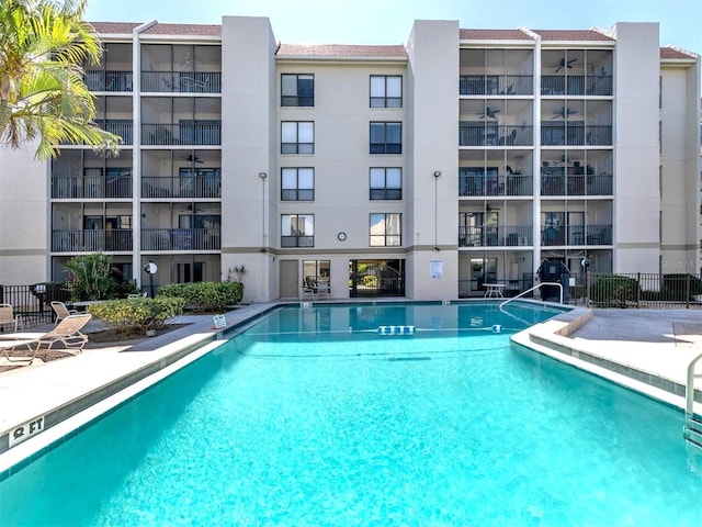 community pool with fence