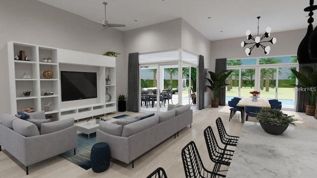 living room with a notable chandelier, a towering ceiling, and light hardwood / wood-style flooring