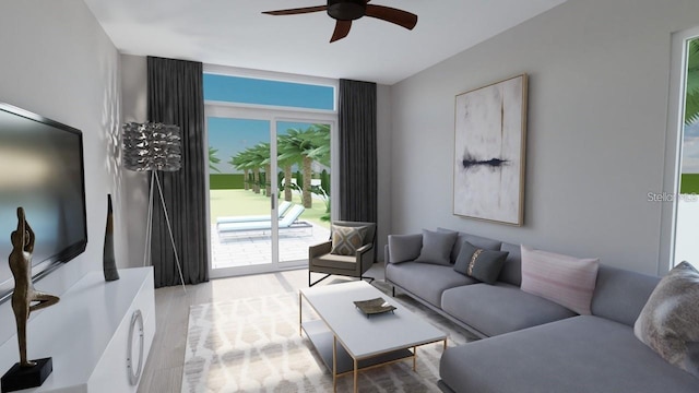 living room featuring ceiling fan and hardwood / wood-style floors