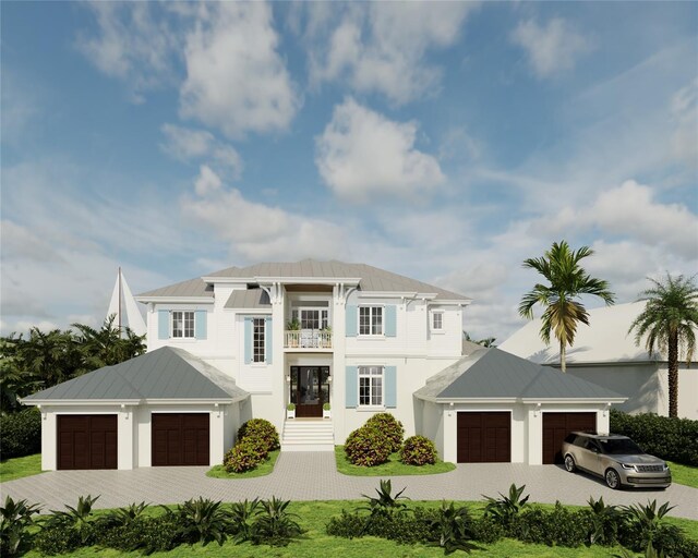 view of front of property with a balcony and a garage