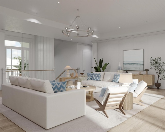 living room with light wood-type flooring and an inviting chandelier