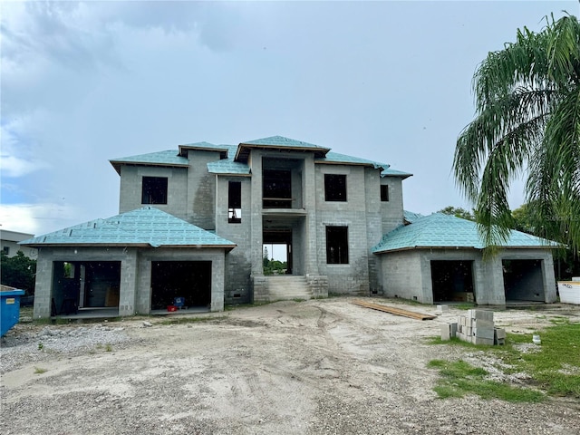 view of front of property with a garage