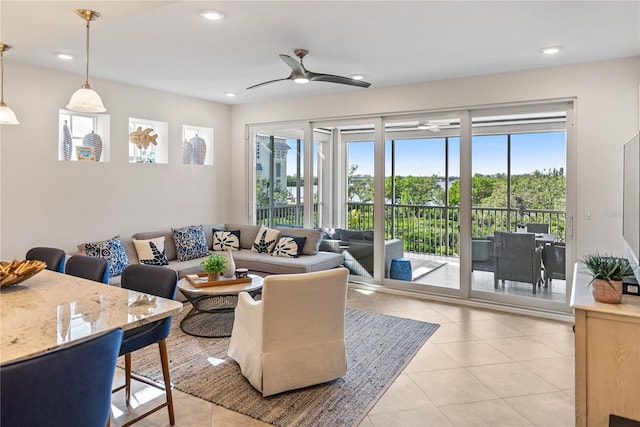 tiled living room with ceiling fan