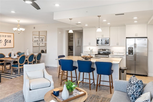 living room featuring an inviting chandelier