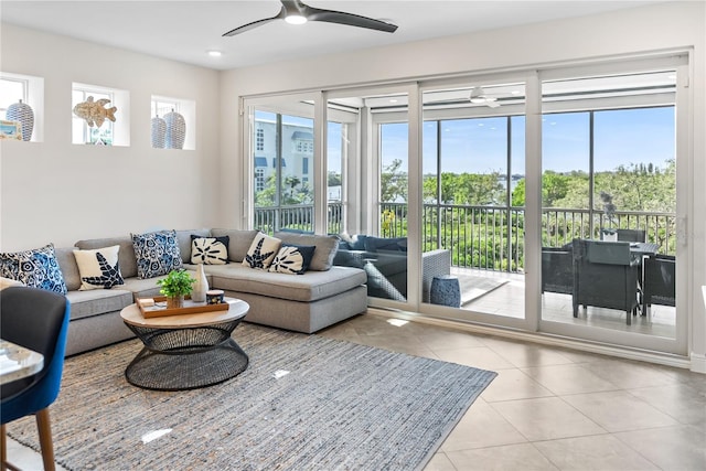 tiled living room featuring ceiling fan