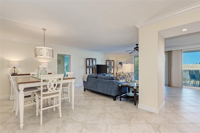 dining area with ceiling fan, light tile patterned floors, baseboards, and crown molding