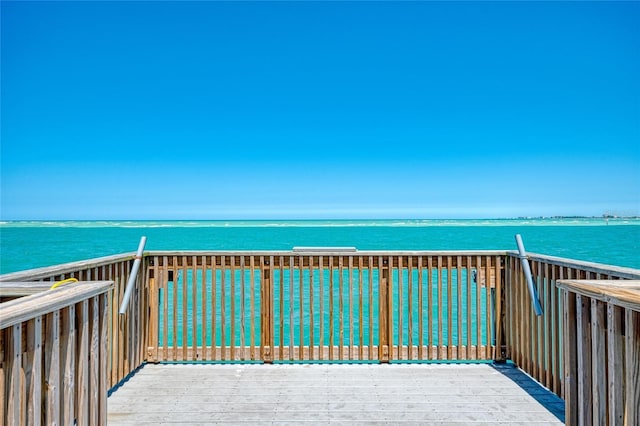 wooden terrace with a water view