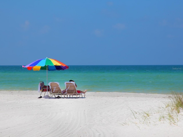 property view of water with a beach view