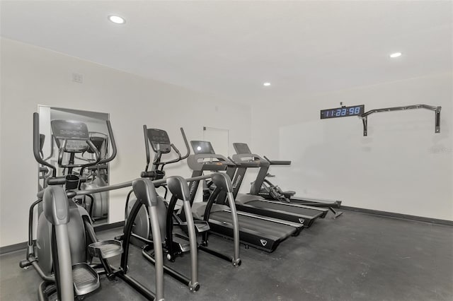 workout area with recessed lighting and baseboards