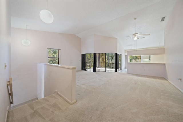 1654 Starling Dr Unit 201, Sarasota, FL 34231 - carpeted spare room with high vaulted ceiling, visible vents, ceiling fan, and baseboards