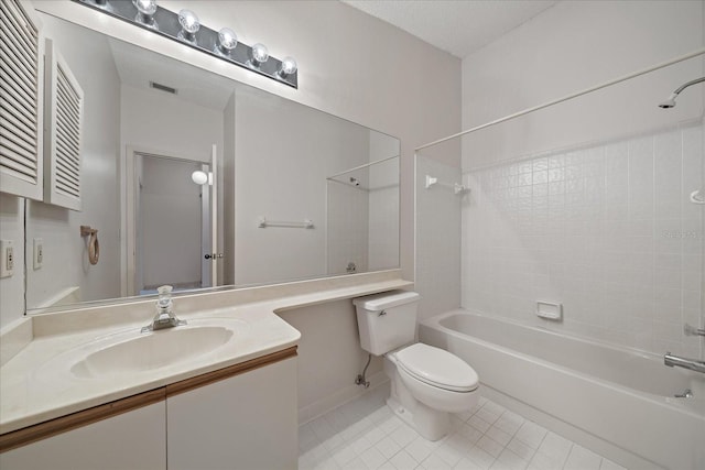 1654 Starling Dr Unit 201, Sarasota, FL 34231 - bathroom with toilet, tile patterned flooring, shower / washtub combination, and vanity