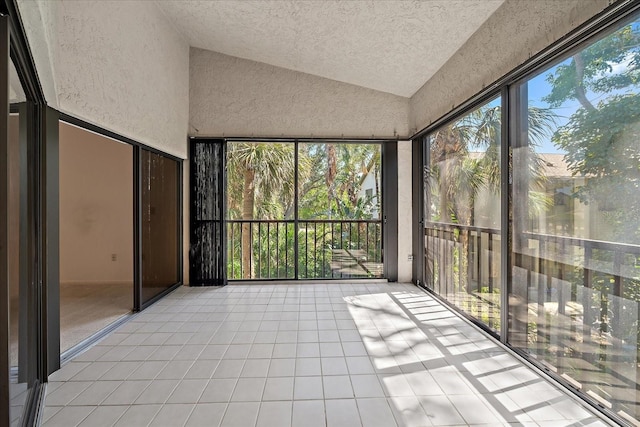 1654 Starling Dr Unit 201, Sarasota, FL 34231 - unfurnished sunroom with vaulted ceiling