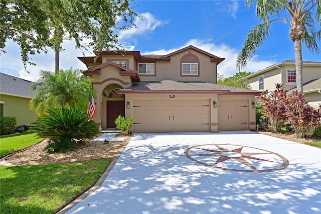 view of front of property with a garage