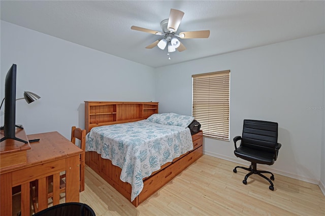 bedroom featuring ceiling fan and light hardwood / wood-style floors