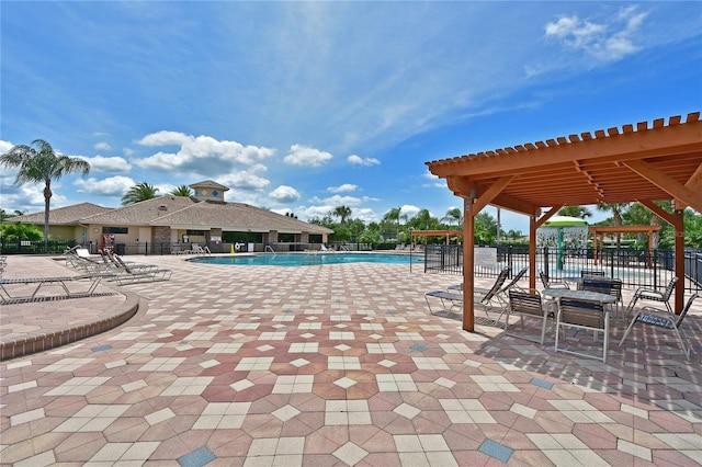 view of swimming pool featuring a patio area