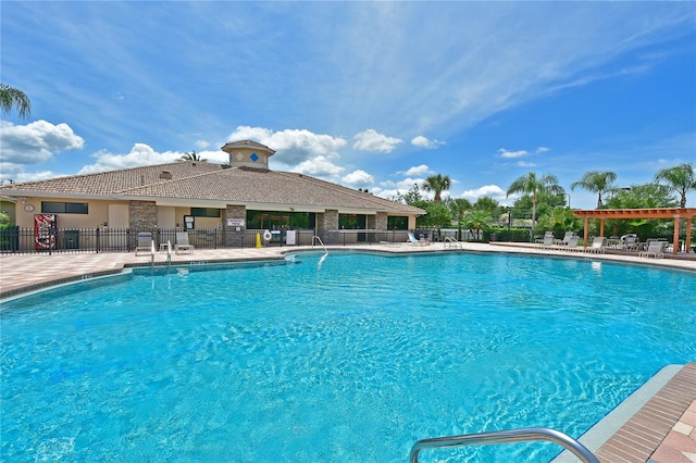 view of swimming pool featuring a patio