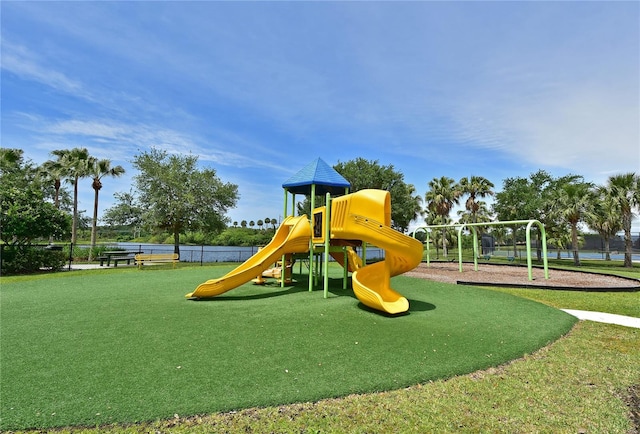 view of playground with a yard