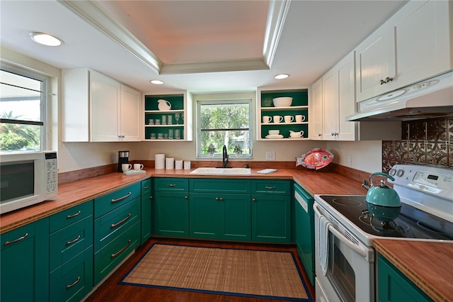 kitchen with open shelves, white appliances, butcher block countertops, and a sink